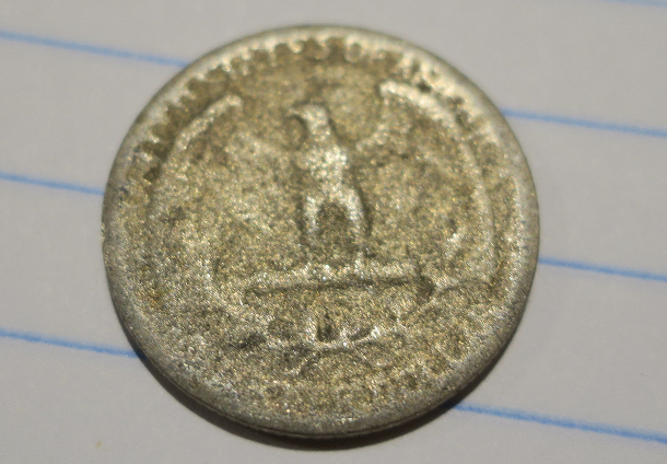 1942-Quarter-Capped-Die?-Damage?-Or-Something-Else.
